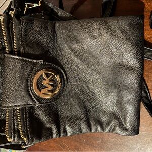Michael Kors Black Leather Messenger Bag with Gold Accents